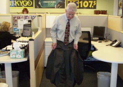 Denver magician levitating in the KYGO FM office