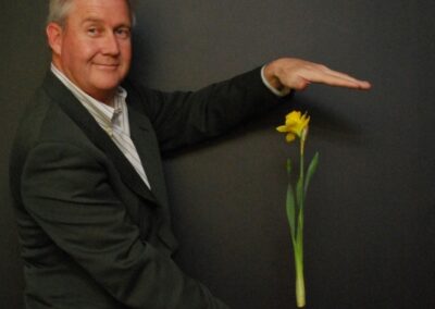 Magician Bruce Erickson floating a flower mid-air
