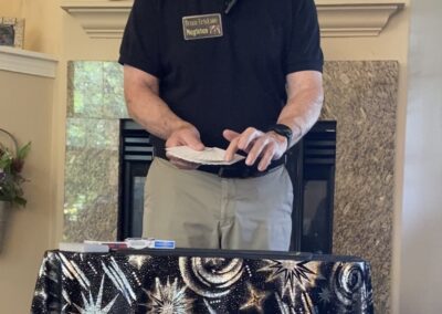 performing a card trick with a blank deck of cards